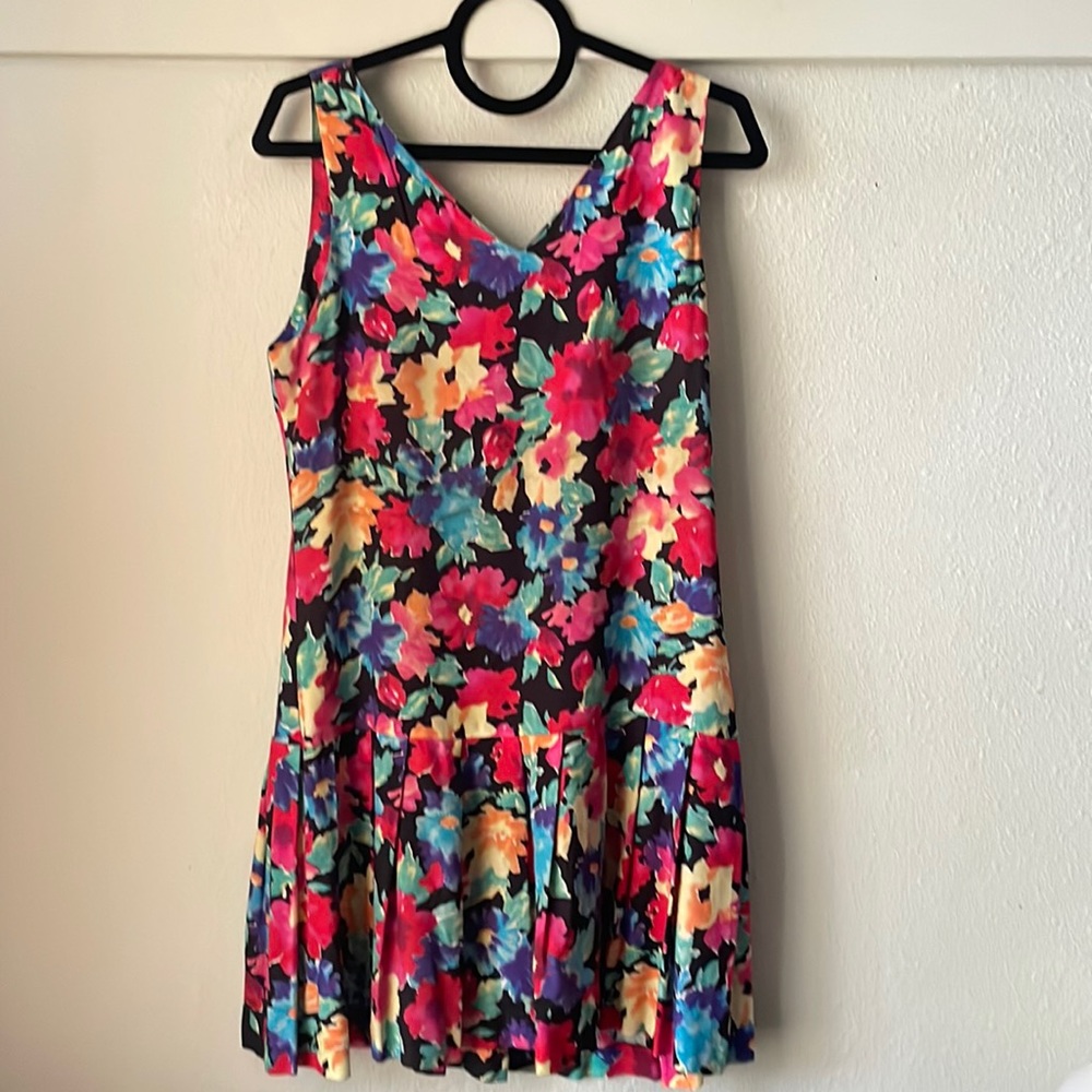 Vintage floral sleeveless mini dress with ruffled hem detail by Betsys Thing